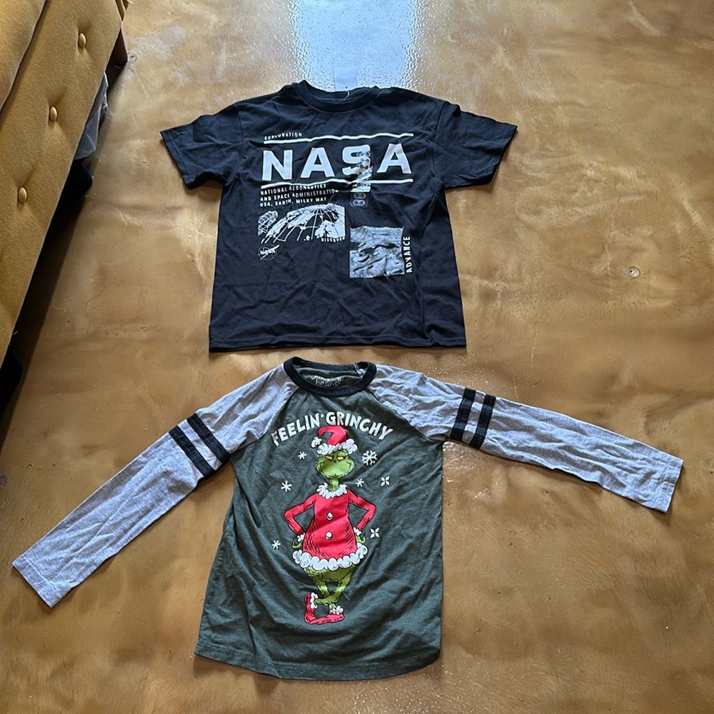 Kids set  of tops in new condition.  One size 7 and the other size 8